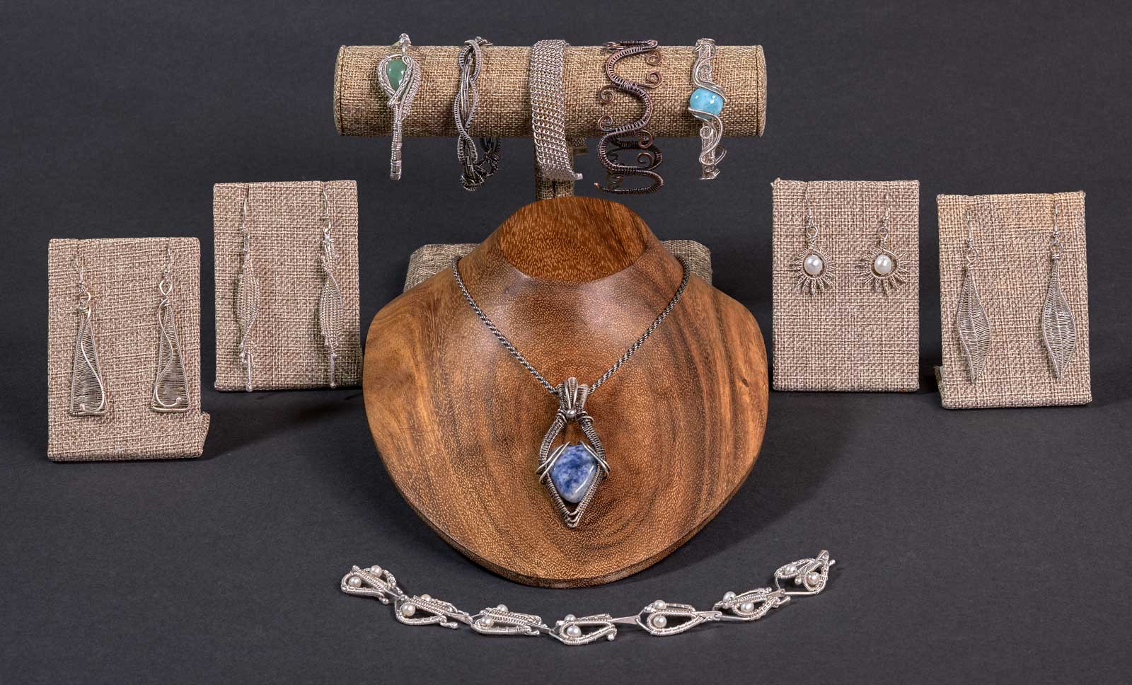  Included in this photo (left to right): Geometric Snake • Twisted Sisters • Prescious Heart • Pearl Hearts Bracelet • Starburst • Leaves; &nbsp;Rear Bracelets (left to right): April Showers • Maelstrom • Woven Milanese Cuff • Greek Cuff • Waterfall 